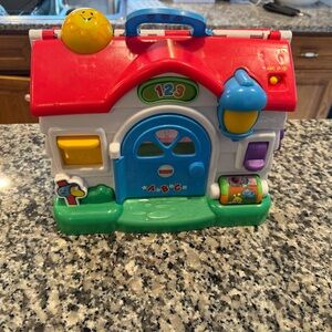 Fisher-Price Colorful Learning Playhouse - Red Roof, Blue Door, Green Base